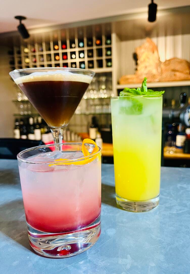 Espresso martini, pink sour and mojito cocktails at The Red Lion bar