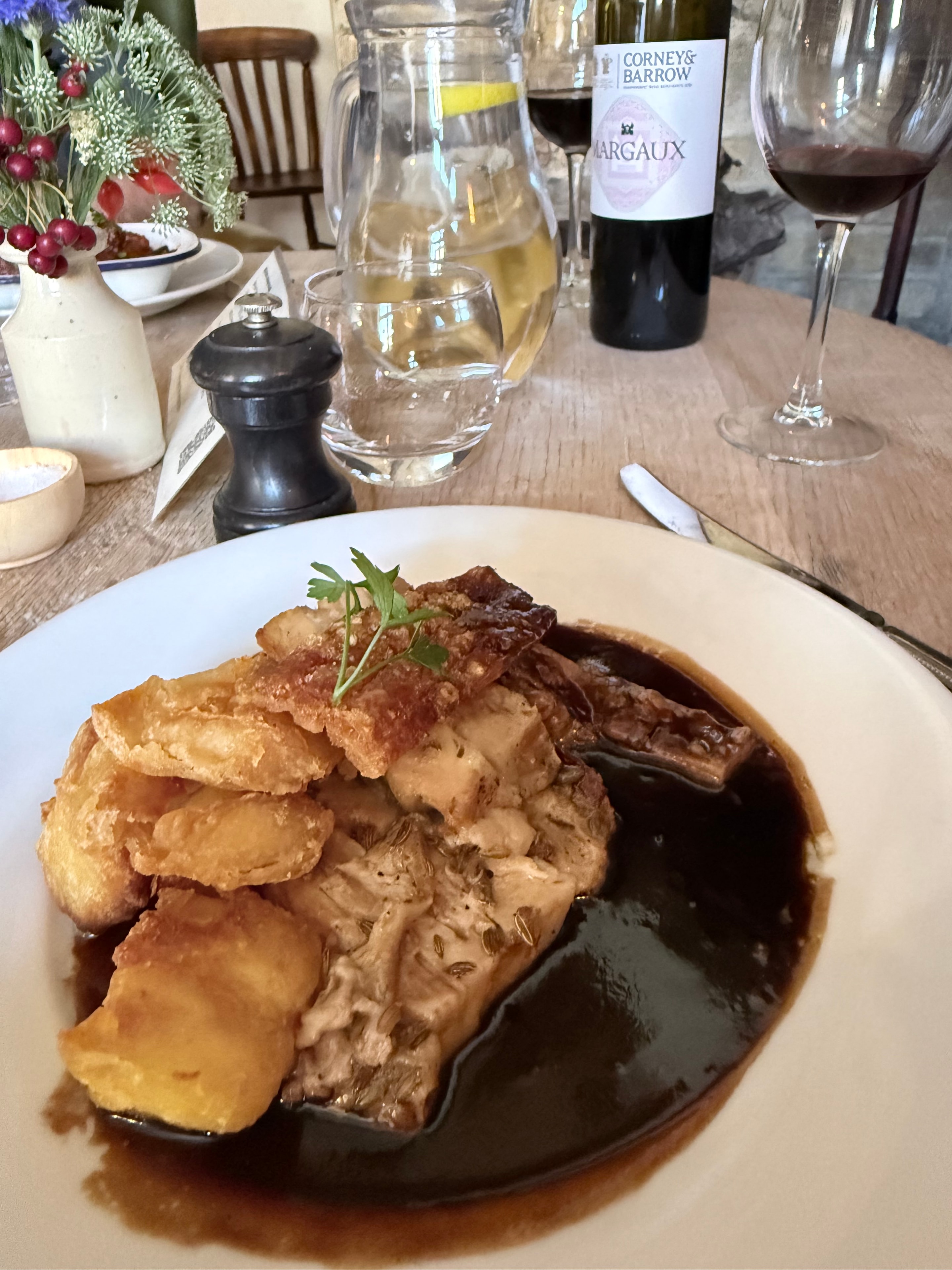 Guest photo: slow-braised duck leg with roast potatoes and red wine at The Red Lion, Soham