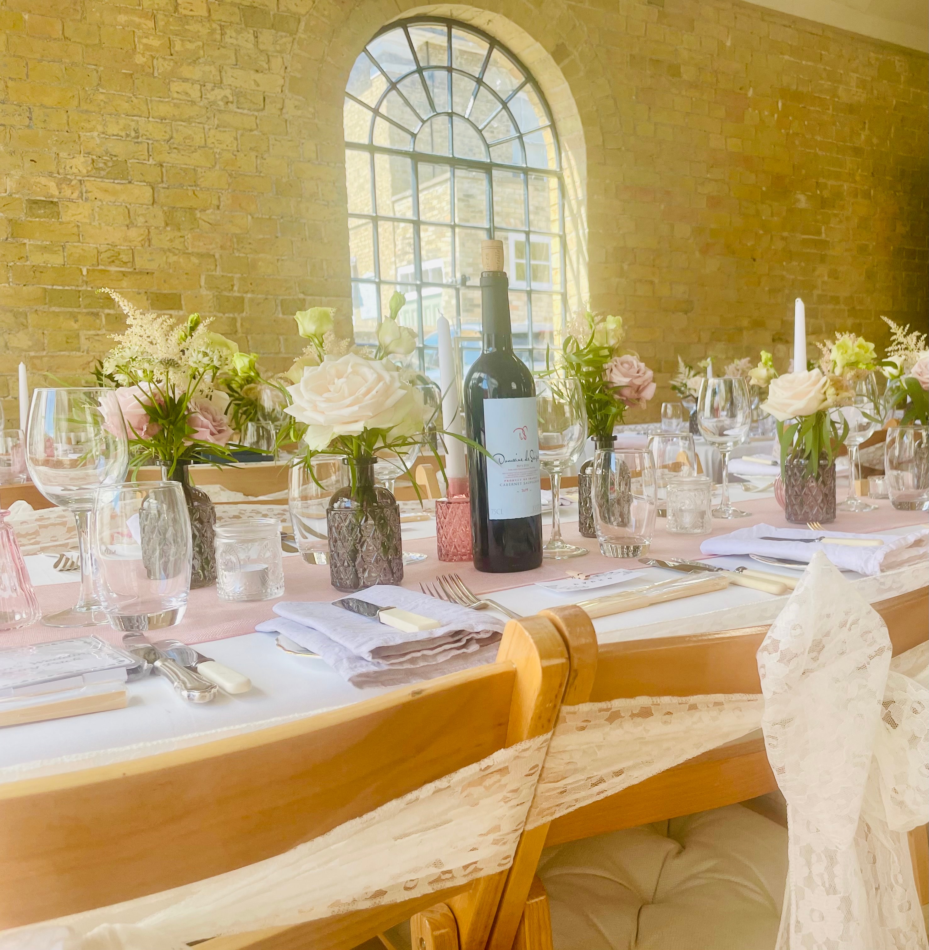 Elegant wedding reception table setting at The Coach House