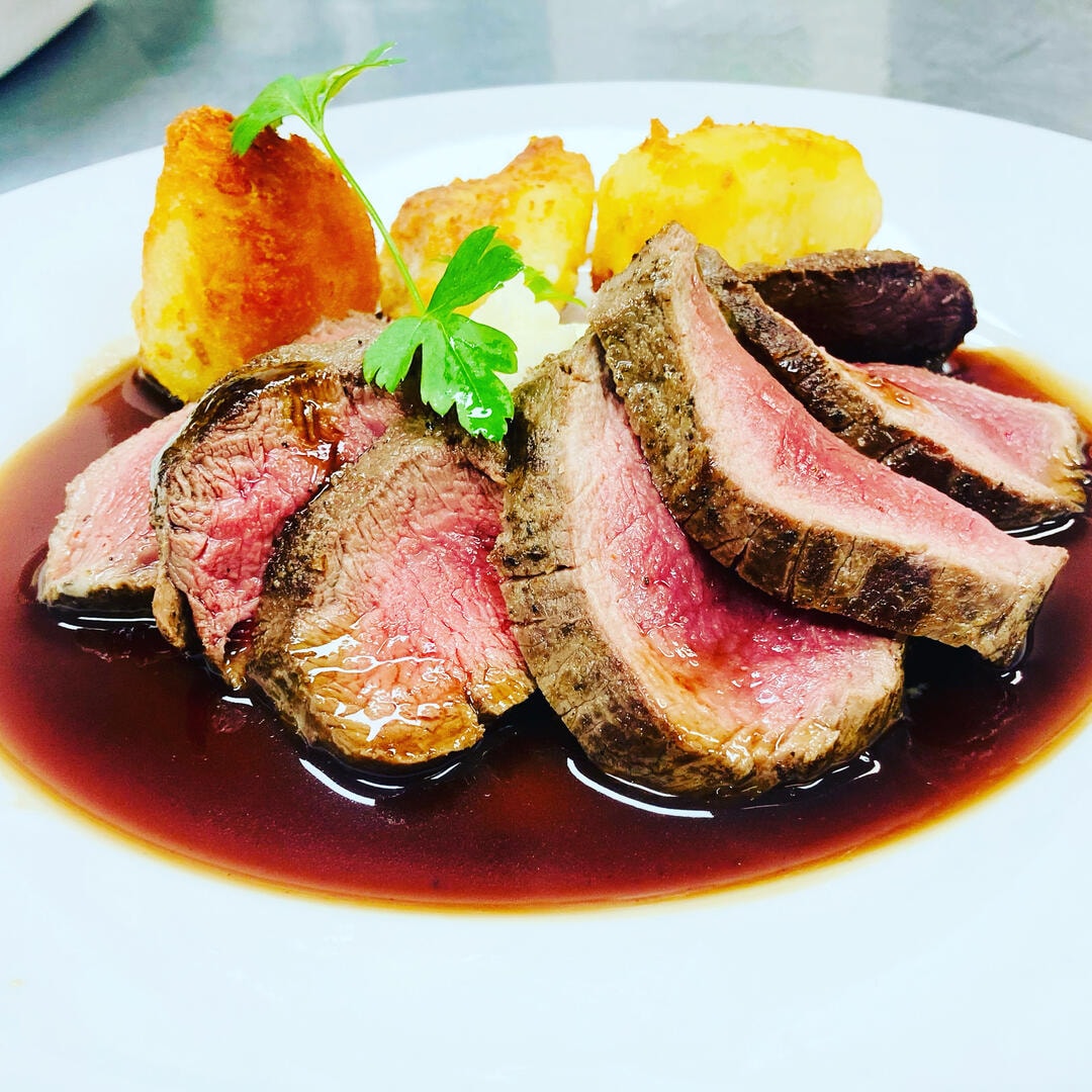 Venison fillet with roasted potatoes and sauce