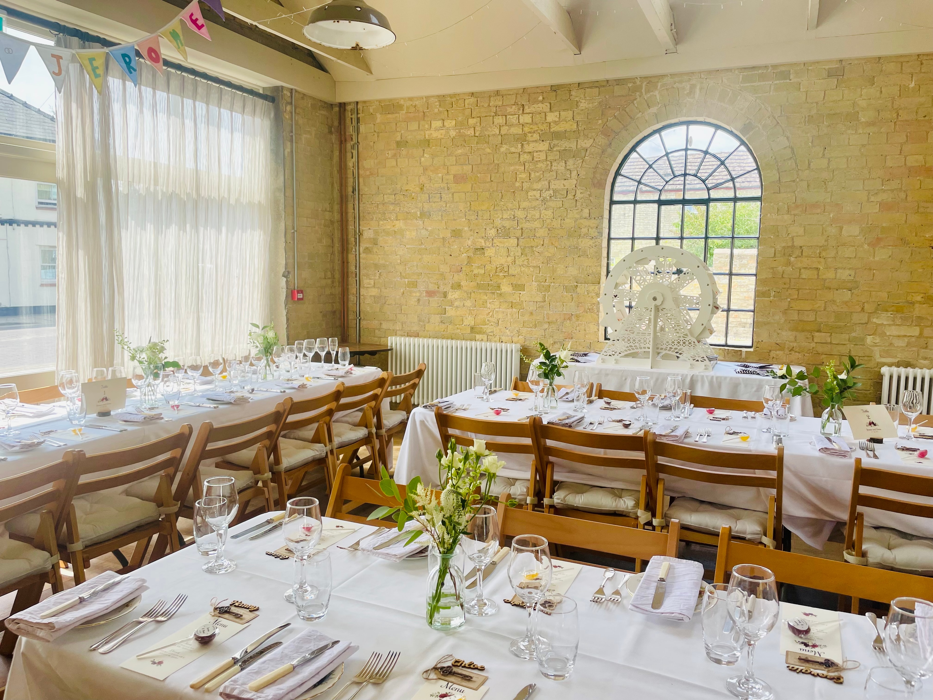 The Coach House banquet hall set for a formal wedding dinner